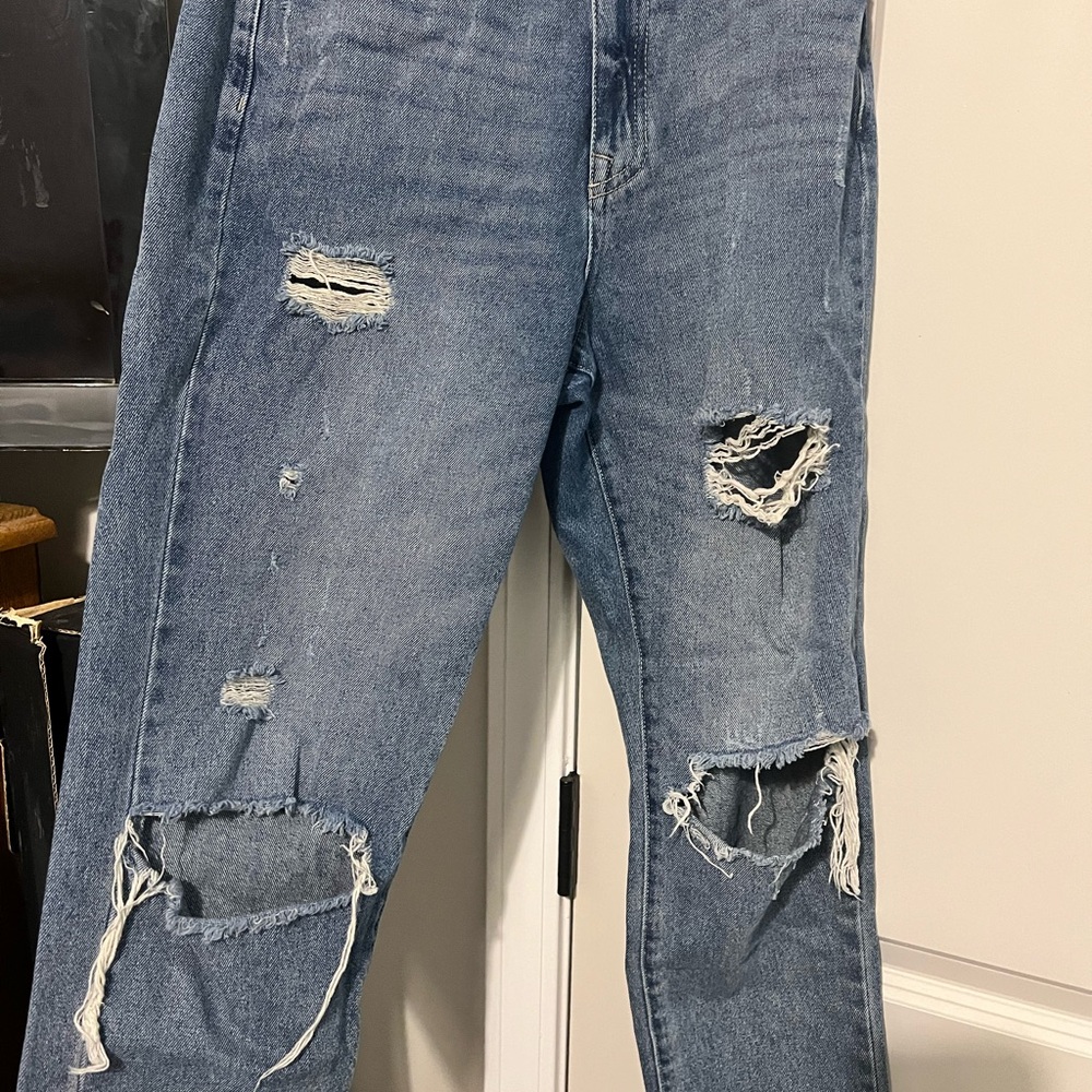 Women's Distressed Blue Jeans